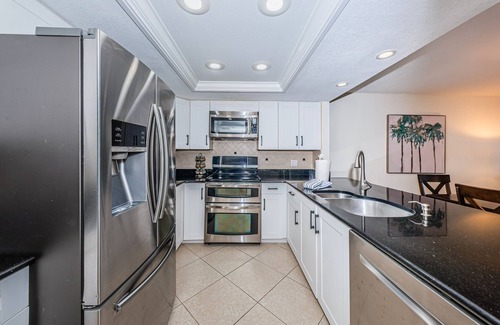 Indian Shores Condo | POOL OPEN ! ELEVATOR IS WORKING! BCHFRONT PENTHOUSE Million View
