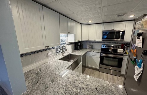 North Beach Haven Condo | Pool. Smart TV. WiFi. Beach Badges. Beach Chairs Patio.O/S. W/D. 140155