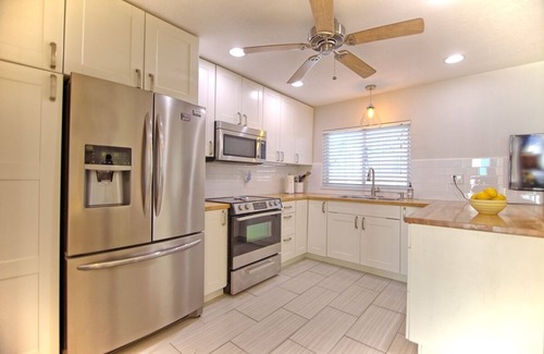 St. Pete Beach Apartment | Poolside on first floor with workspace and updated kitchen