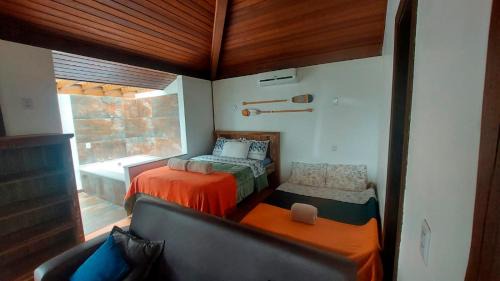 Sambaqui House | Pousada Águas de Ibiraquera Suíte Ribanceira