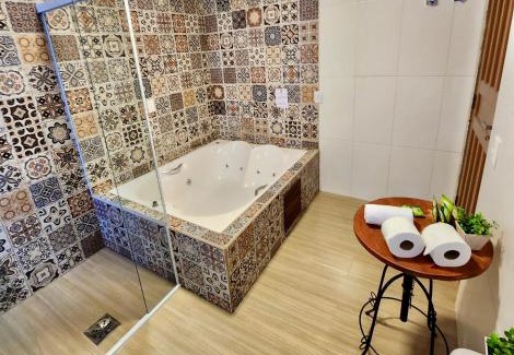 Jardim Manancial Hotel | Pousada Bliss House - Opções de suites com hidromassagem