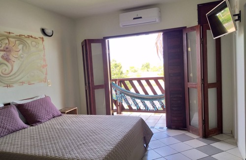 Prado Hotel | Pousada Coral de Fogo