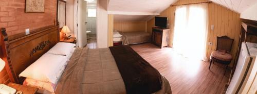 Vila Everest Hotel | Pousada do Sino