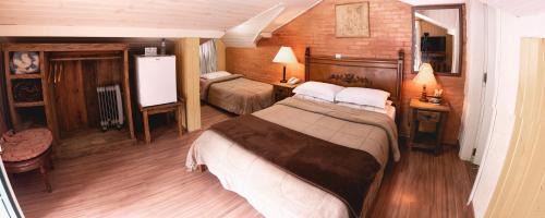 Vila Everest Hotel | Pousada do Sino