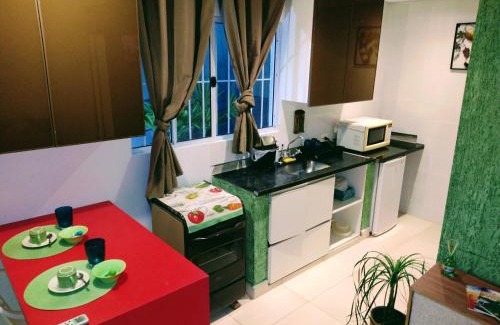 Pereque Apartment | Pousada Ideal Guarujá - Estúdios Mobiliados, Ar-Condicionado e Cozinha
