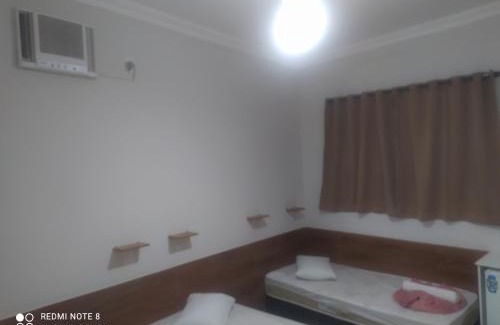 Aparecida Apartment | Pousada Quarto Deluxe perto da basílica com garagem