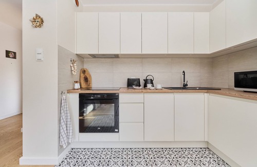 Grunwald Apartment | Poznan Apartment With Garden by Renters