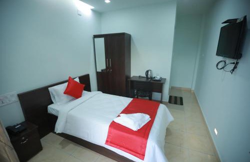 Kunnamkulam Hotel | Premier Tourist Home