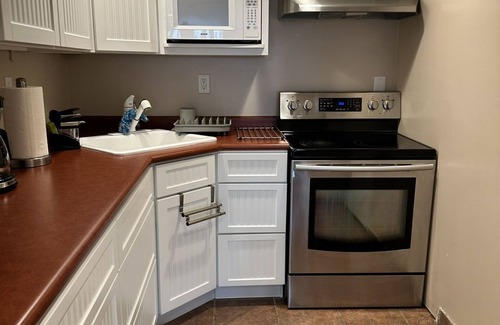 Olympus Cove Apartment | Premium Olympus Cove Daylight Walkout Apartment