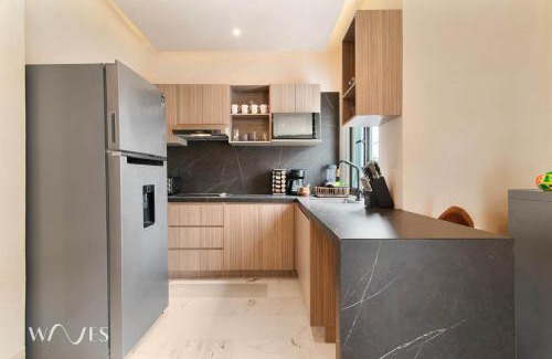 12th Street Apartment | Prime 5th Ave Stay - 4BR with King Beds & City Views