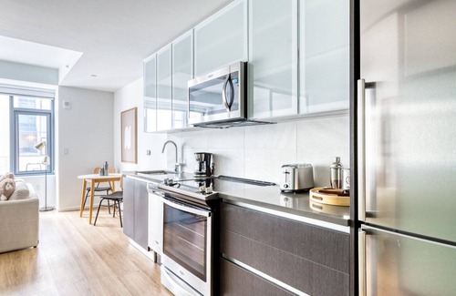 Shawmut Apartment | Prime NewCo South End Studio near Ink Block w. W/D and Gym by Blueground