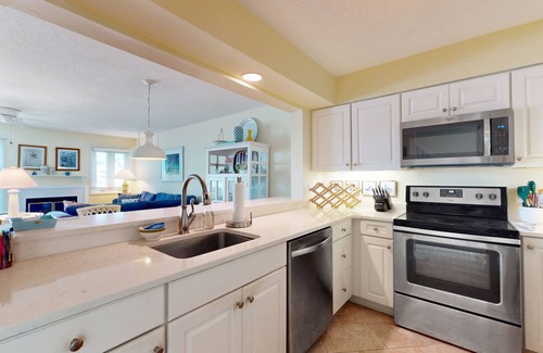 Heron Harbour Isle House | Pristine bay front townhome in Ocean City: Sweeping views, modern amenities