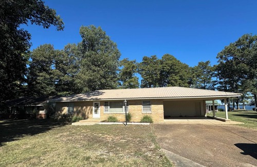 Samburg House | Pristine Lakefront Home has lots of space and amazing views.