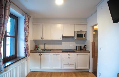 Kranjska Gora Apartment | Pritlični apartma Hribovc z atrijem v bližini Golf Cluba