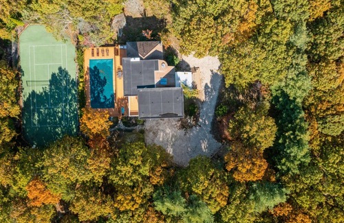 North Sea House | Private 2.1 acre gated home with heated pool and tennis & pickleball court