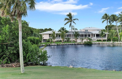 Key Largo House | Private 5 BR Ocean Reef Estate overlooking pond and The Hammock Golf Course.