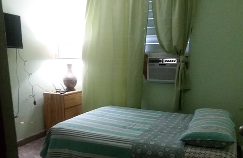 Hato Rey Central Apartment | Private Bedroom # 1 in Floral Park, San Juan, Puerto Rico with A/C, Wi-fi