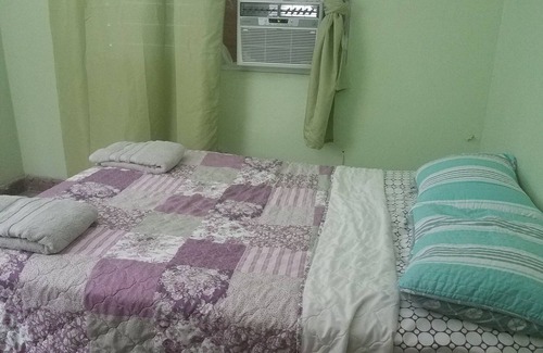 Hato Rey Central Apartment | Private Bedroom # 1 in Floral Park, San Juan, Puerto Rico with A/C, Wi-fi
