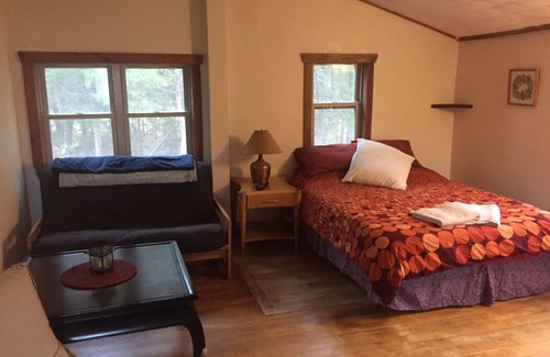 Cedar Grove Cabin | Private Cabin located at a Farmhouse Cidery + Winery + Farm