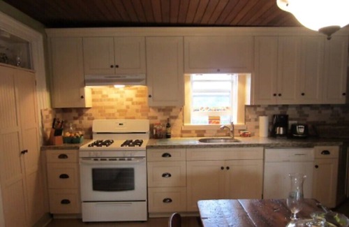Milford House | Private Century Home Waterfront Getaway with Acreage