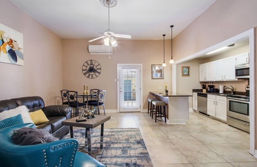 Faubourg Livaudais Condo | PRIVATE COURTYARD! ST.CHARLES AVE! GARDEN DISTRICT!