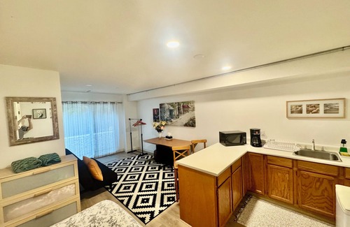 West Vancouver House | Private guest room with separate washroom and entrance