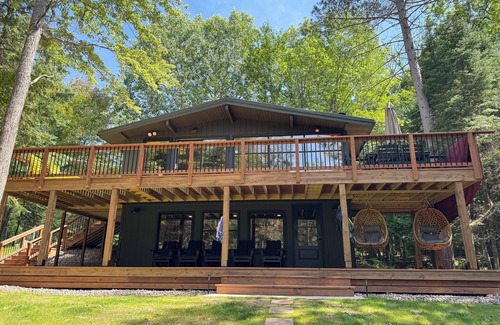 Presque Isle Cabin | Private Lakefront with Beautiful Sunsets, Kayaks, Large Decks, FirePit, & Wi-Fi