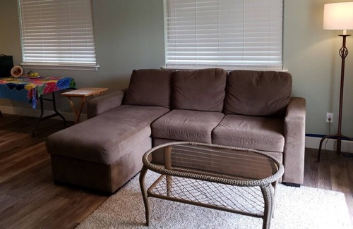 Fern Acres Apartment | Private large studio with wrap around lanai, new and clean.