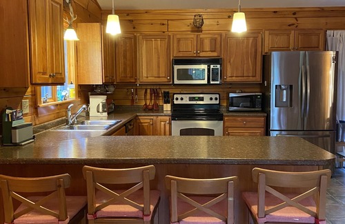 Bethel Cabin | Private log cabin, minutes from skiing, river fun, and biking