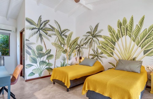 Kralendijk House | Private room with patio view - Boutique Hotel Wanapa