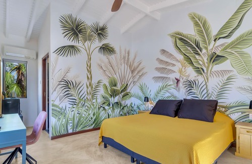 Kralendijk House | Private room with patio view - Boutique Hotel Wanapa