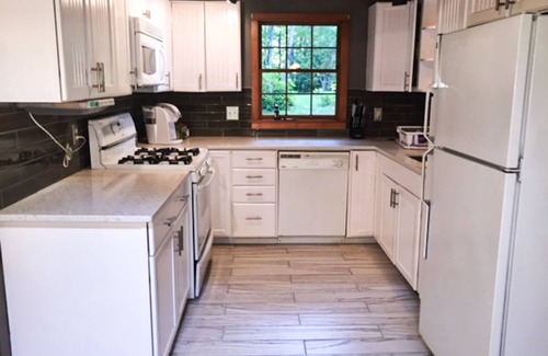 Naples House | Private waterfront cabin with large deck, private dock, kayaks & gas grill