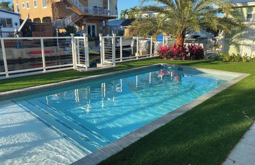Key Largo Village House | Private Waterfront Home – with Heated Pool & Boat Dock