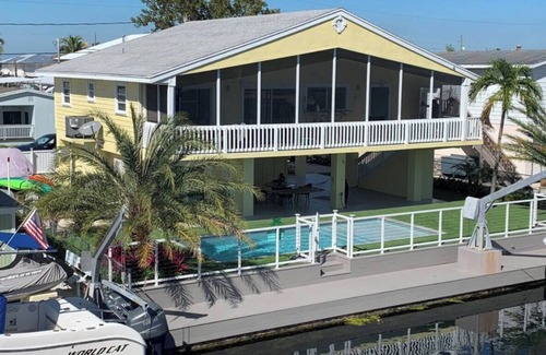 Key Largo Village House | Private Waterfront Home – with Heated Pool & Boat Dock
