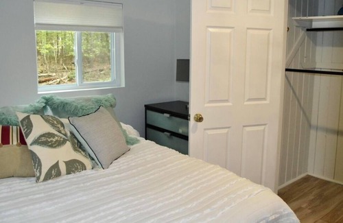 Higgins Lake Cabin | Private wooded cabin on one+ acre less than 1 mile from beautiful Higgins Lake.