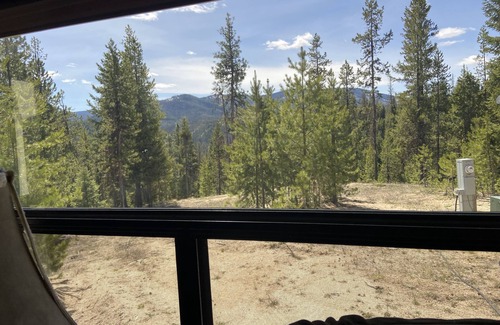 Lolo House | Private Wooded Camp site with fully equipped fifth wheel above Lolo Hot Springs