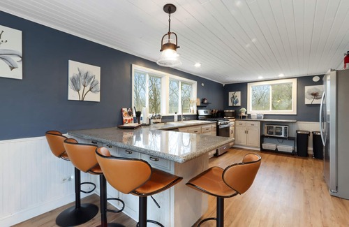 Williams Bay House | Private wooded retreat, 5BR/3BA within walking distance of Geneva Lake.