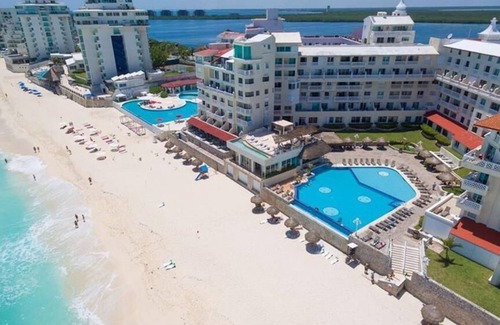 Zona Hotelera Villa | Privately owned 3 bedroom Ocean front condo with 25 ft beachfront terrace