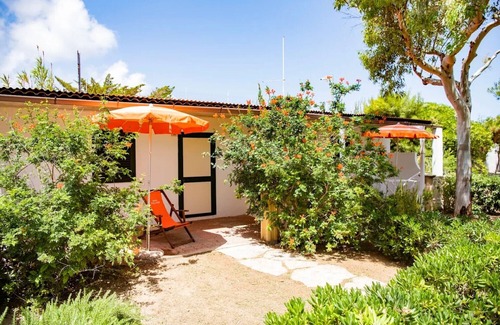 Chiesiola Resort | Property in a holiday village 'Baia Falcone-Bilocale 403' with sea view and air conditioning