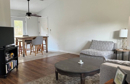 Beaufort House | Quaint Lady’s Island home with a large fenced in yard shaded by a mossy oak!