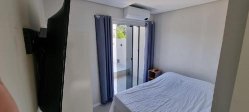 Ribeirao da Ilha Apartment | Quartos Confortáveis em casa compartilhada - 5 min Aeroporto Internacional