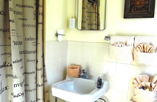 Mount Ida Apartment | Queen Guest Room located at the Joplin Inn at the entrance to Mountain Harbor, just 2 1/2 miles from Lake Ouachita. by RedAwning