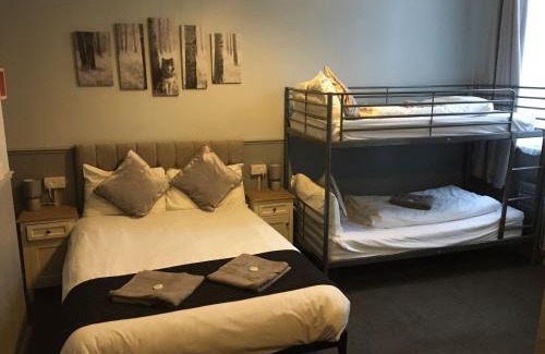 Cheetham Hill House | Queens Guesthouse Manchester