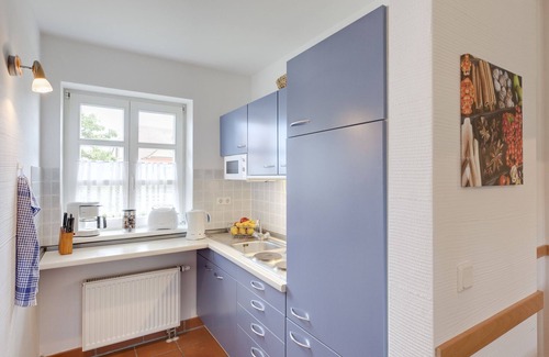 Kreptitz Apartment | quiet apartment near the beach on the ground floor + DG with garden incl. Indoor swimming pool /sauna etc.