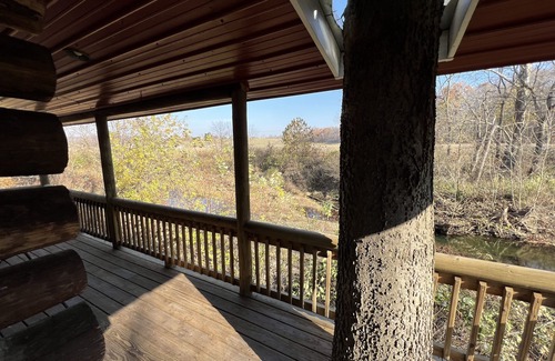 Hallsville Cabin | Quiet Cabin on Walnut Creek, Covered Deck, Hot Tub, Swimming Hole, Shelter House