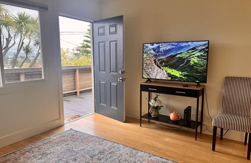 Belmont Apartment | Quiet Garden Escape with Sunset View Walkable to Train, Shops, Belmont Apt. 1/1