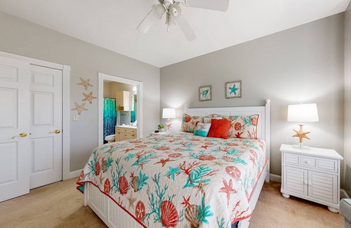 Central Myrtle Beach Condo | Quiet golf community with security, covered balcony, W/D, AC, & pool access