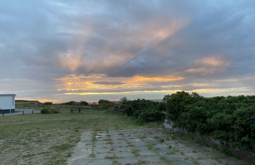 Aldborough Ski Chalet | Quiet holiday park on North Norfolk Coast. 5 minute walk to dog friendly beach.