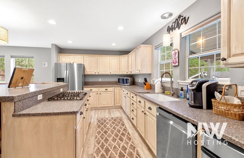 Coeur d'Alene House | Quiet Neighborhood Retreat—Huge Corner Lot, Sauna, & Covered BBQ Area for Outdoor Fun!