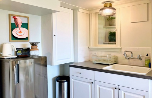 Phinney Ridge Apartment | Quiet Phinney Ridge gem with view of Olympic Mountains and dedicated workspace